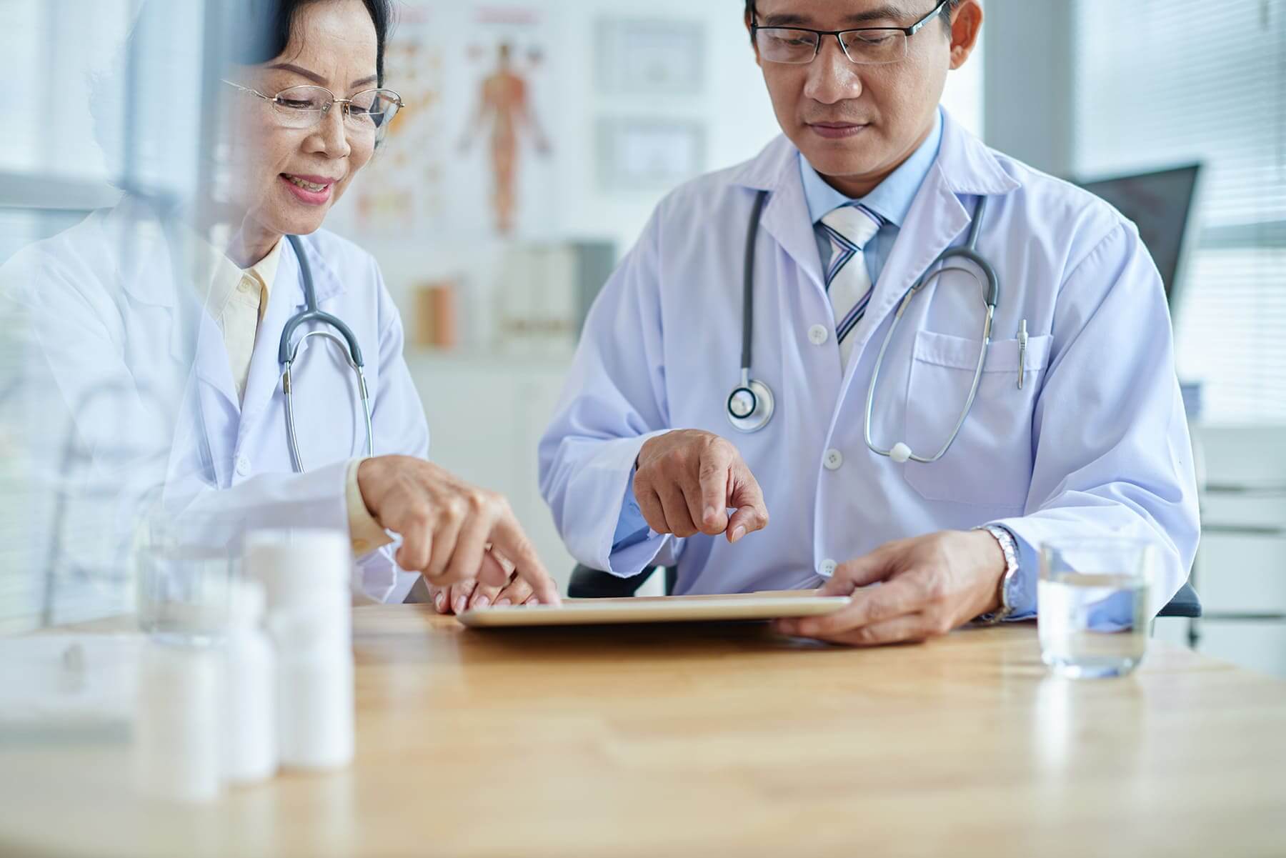 Doctors discussing treament options - SGIP